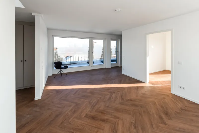 Traumhaftes modernes Wohnen im Dachgeschoss mit EBK und Süd-West-Ost Ausblick! — photo 1
